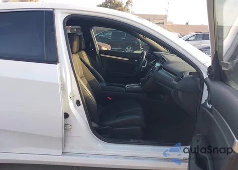 2020 Honda Civic Sport z USA, uszkodzony, nr VIN 19XFC2F8XLE216119